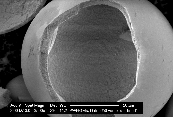 ARC Hitachi SEM of a fractured hollow glass microsphere; original instrument scale bar retained